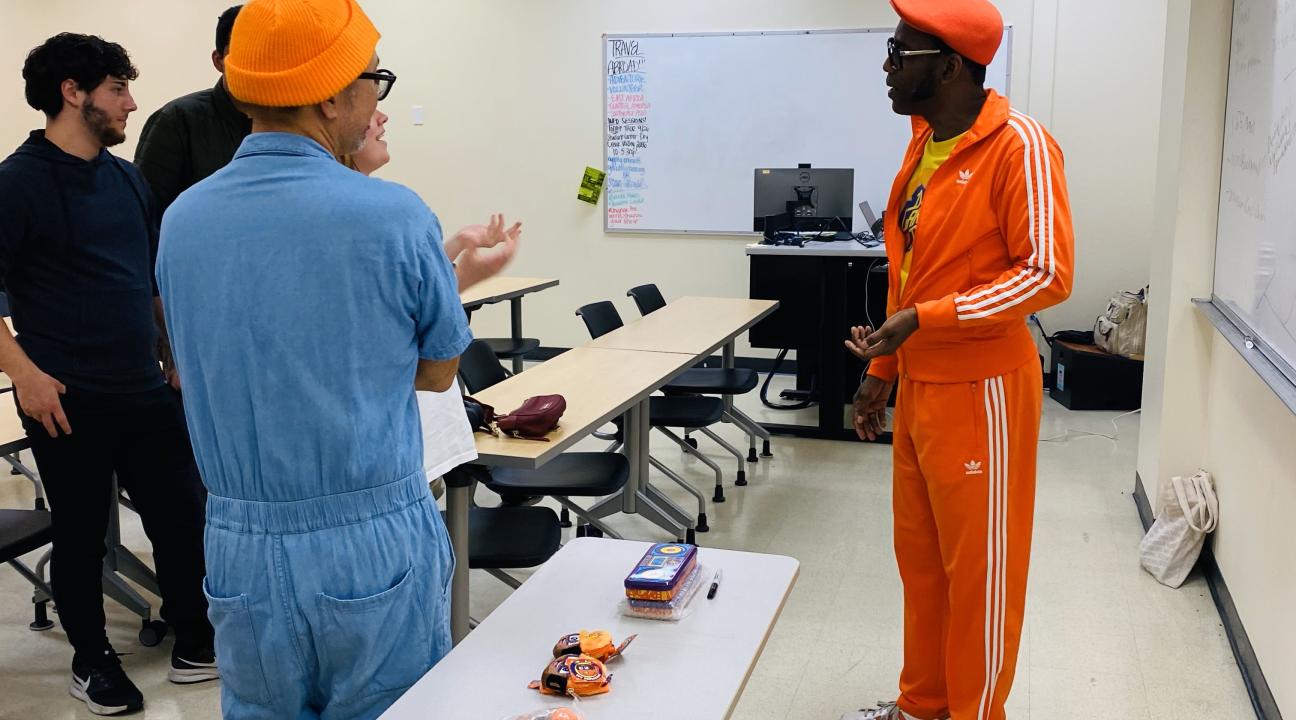 dj lance talking to student