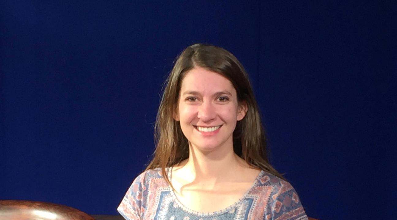 Photo of Tara Cheitlin sitting in studio.