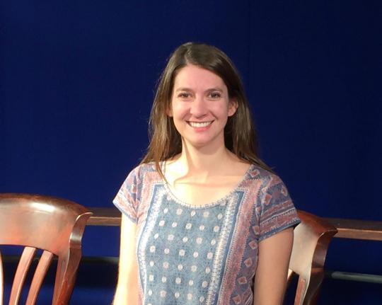 Photo of Tara Cheitlin sitting in studio.